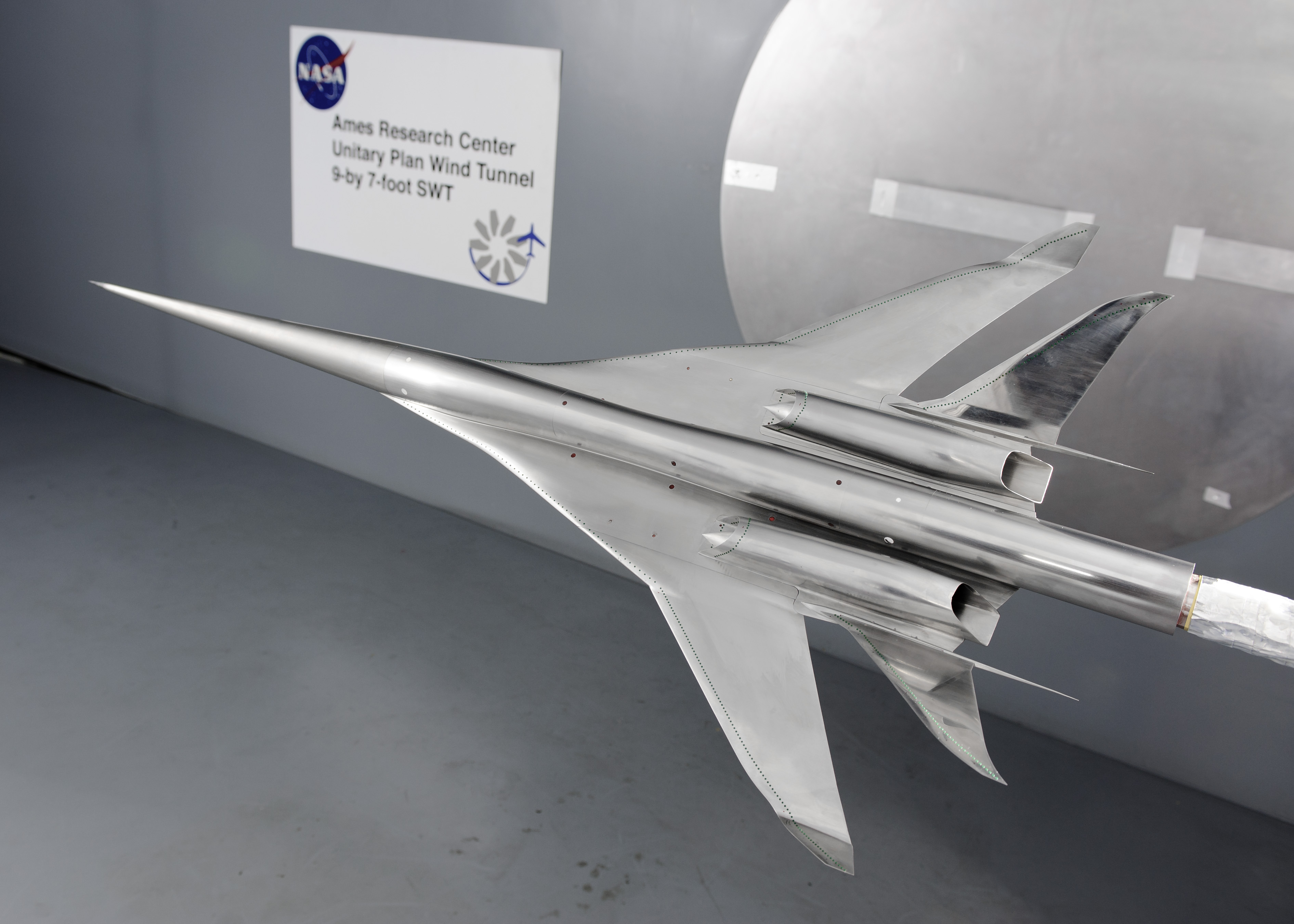 Tests of scale models like this one in a supersonic wind tunnel at NASA's Ames Research Center help researchers understand the forces acting on the aircraft that create sonic booms.