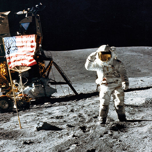 Apollo Astronaut saluting flag on the moon